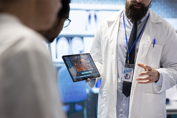 doctor reviewing solutions with patient using medical ai on a tablet