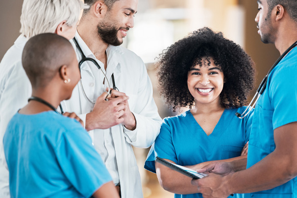 group of doctors and nurses collaborating