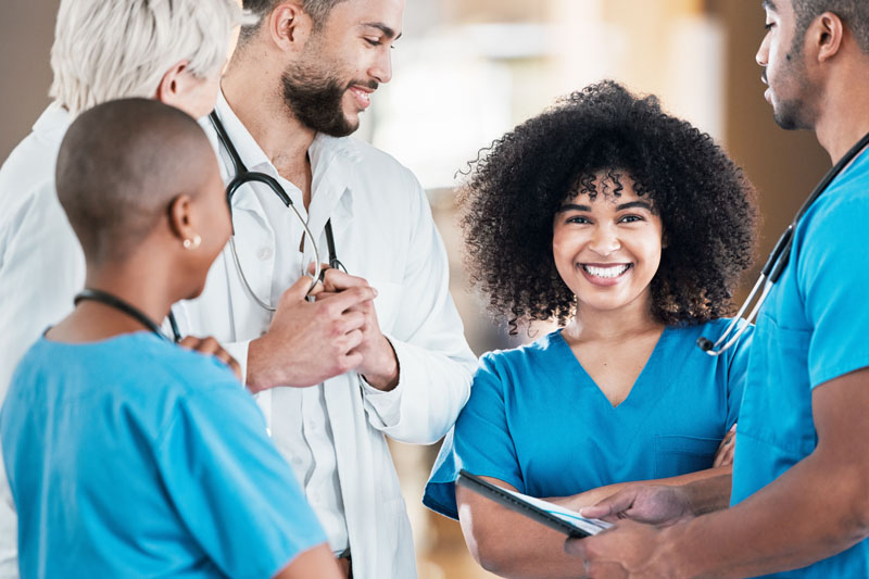 group of doctors and nurses collaborating
